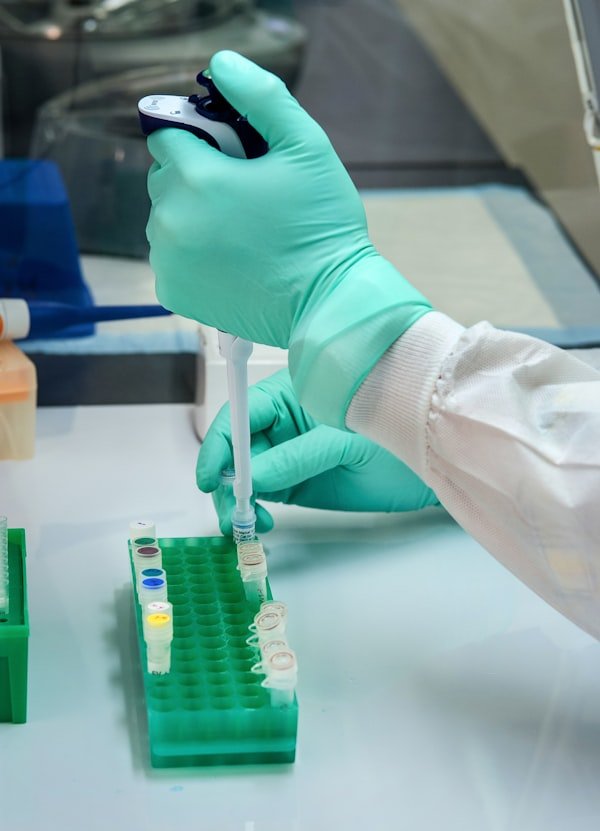 Scientist handling samples in the laboratory